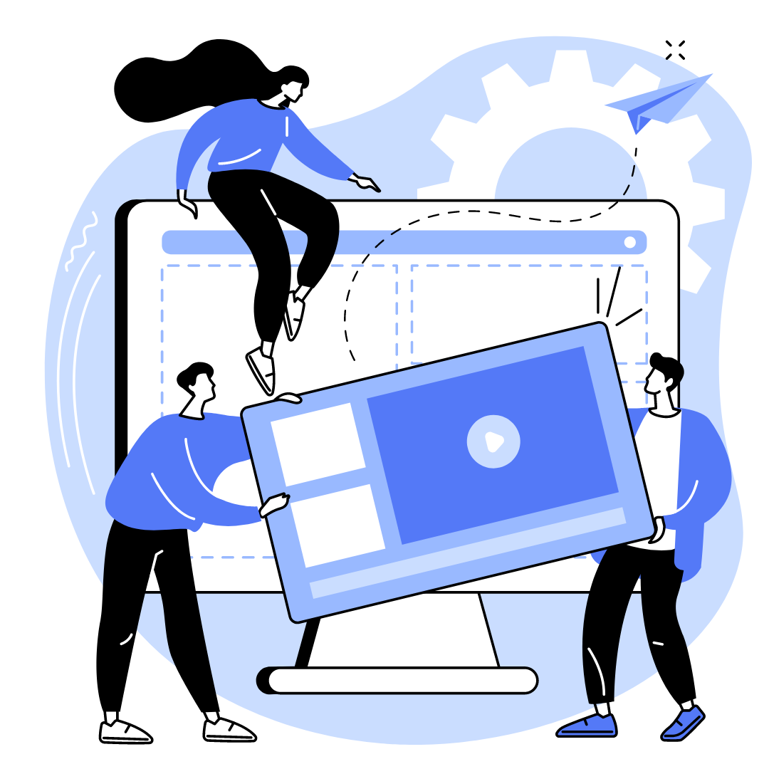 Two website designers collaborating to position a video element onto a large desktop monitor, guided by a senior designer overseeing the process.